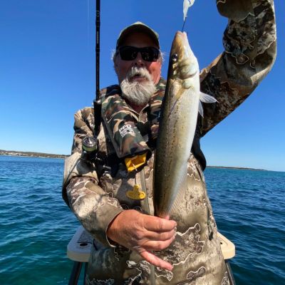 Steve Starlo with his latest King Whiting Catch in Ridgeline Infinity rain jacket